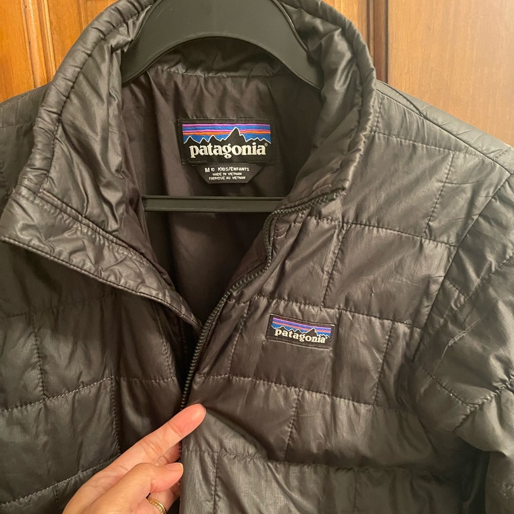 Boys black Patagonia jacket medium size 10